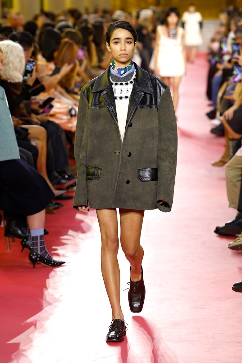  A model walks the runway during the Miu Miu Womenswear Spring/Summer 2026 show as part of Paris Fas...